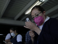 A nurse loads a syringe in a vaccination unit at the Constitución de 1917 metro station in Mexico City, where the AstraZeneca biological is...