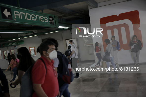 Passers-by inside the Constitutción de 1917 metro station in Mexico City, where the AstraZeneca biological is being applied to people who ha...