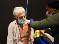 A woman gets 4th jab at a vaccination centre in Doncaster on 28 April 2022. (