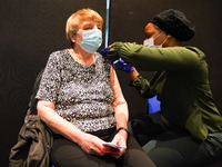 A woman gets 4th jab at a vaccination centre in Doncaster on 28 April 2022. (