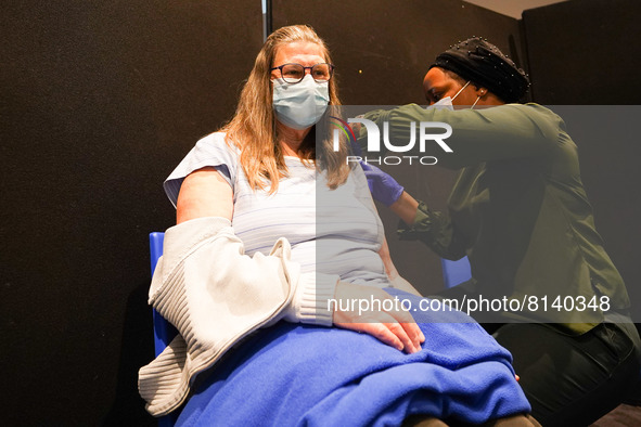 A woman gets 4th jab at a vaccination centre in Doncaster on 28 April 2022. 