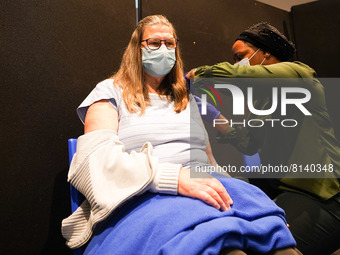 A woman gets 4th jab at a vaccination centre in Doncaster on 28 April 2022. (