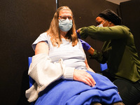 A woman gets 4th jab at a vaccination centre in Doncaster on 28 April 2022. (