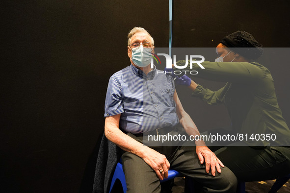 A man gets 4th jab at a vaccination centre in Doncaster on 28 April 2022. 