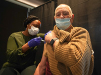 A man gets 4th jab at a vaccination centre in Doncaster on 28 April 2022. (