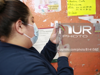 A nurse prepares a Covid-19 dose during a vaccination program in the local markets as attempt to reduce risk of contagion. On April 27, 2022...