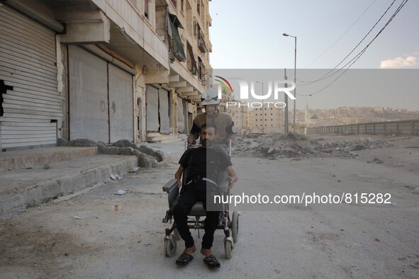 Malik Sabag a 15-year-old Syrian civil defense, Malik is helping an old man in crossing the street at of Al-mashhad district in the northern...