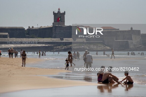 People are seen performing outdoor activities on the coastline of Carcavelos Beach. Lisbon, May 09, 2022. Two months after the lifting of th...