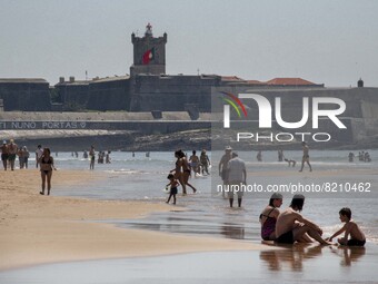 People are seen performing outdoor activities on the coastline of Carcavelos Beach. Lisbon, May 09, 2022. Two months after the lifting of th...