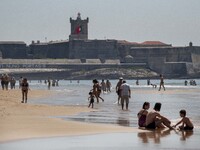 People are seen performing outdoor activities on the coastline of Carcavelos Beach. Lisbon, May 09, 2022. Two months after the lifting of th...