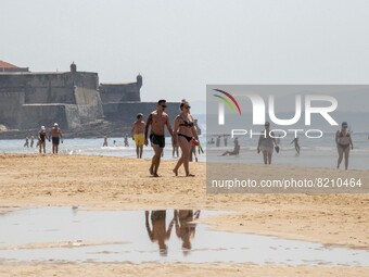 People are seen performing outdoor activities on the coastline of Carcavelos Beach. Lisbon, May 09, 2022. Two months after the lifting of th...