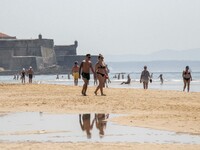 People are seen performing outdoor activities on the coastline of Carcavelos Beach. Lisbon, May 09, 2022. Two months after the lifting of th...