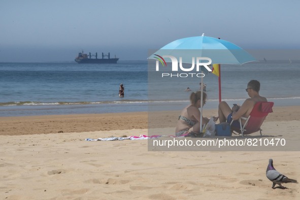 People are seen performing outdoor activities on the coastline of Carcavelos Beach. Lisbon, May 09, 2022. Two months after the lifting of th...