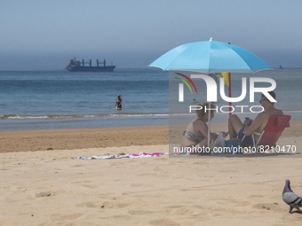 People are seen performing outdoor activities on the coastline of Carcavelos Beach. Lisbon, May 09, 2022. Two months after the lifting of th...