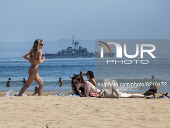 People are seen performing outdoor activities on the coastline of Carcavelos Beach. Lisbon, May 09, 2022. Two months after the lifting of th...