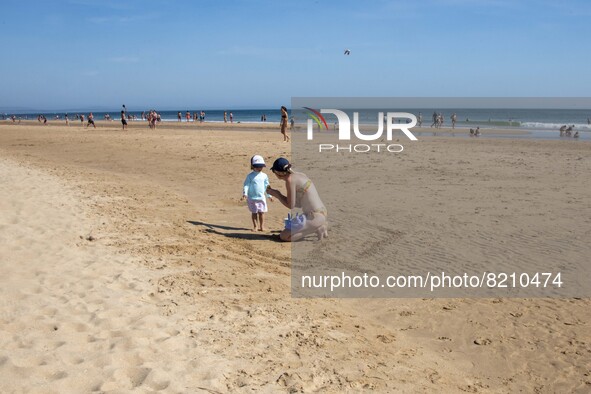 People are seen performing outdoor activities on the coastline of Carcavelos Beach. Lisbon, May 09, 2022. Two months after the lifting of th...