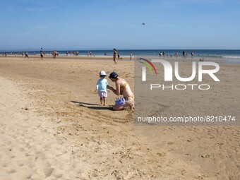 People are seen performing outdoor activities on the coastline of Carcavelos Beach. Lisbon, May 09, 2022. Two months after the lifting of th...