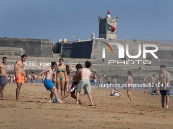 People are seen performing outdoor activities on the coastline of Carcavelos Beach. Lisbon, May 09, 2022. Two months after the lifting of th...