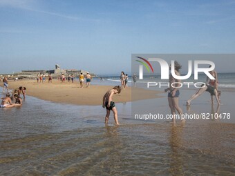 People are seen performing outdoor activities on the coastline of Carcavelos Beach. Lisbon, May 09, 2022. Two months after the lifting of th...