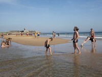 People are seen performing outdoor activities on the coastline of Carcavelos Beach. Lisbon, May 09, 2022. Two months after the lifting of th...