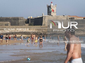 People are seen performing outdoor activities on the coastline of Carcavelos Beach. Lisbon, May 09, 2022. Two months after the lifting of th...