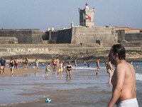 People are seen performing outdoor activities on the coastline of Carcavelos Beach. Lisbon, May 09, 2022. Two months after the lifting of th...