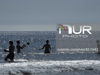 People are seen performing outdoor activities on the coastline of Carcavelos Beach. Lisbon, May 09, 2022. Two months after the lifting of th...