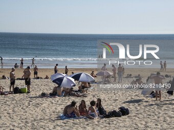 People are seen performing outdoor activities on the coastline of Carcavelos Beach. Lisbon, May 09, 2022. Two months after the lifting of th...