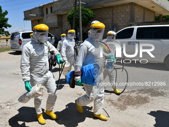 Health workers in the villages of Jindires conduct a campaign to spray pesticides to combat leishmaniasis (Aleppo bean), where the Aleppo mo...