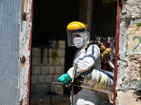 Health workers in the villages of Jindires conduct a campaign to spray pesticides to combat leishmaniasis (Aleppo bean), where the Aleppo mo...