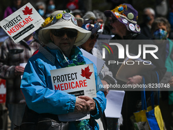 Health-care workers, activists and their supporters protest against Premier Kenney and the UCP government that are taking steps to privatize...