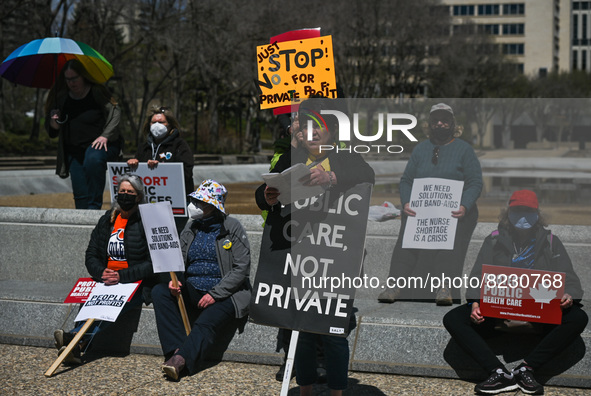 Health-care workers, activists and their supporters protest against Premier Kenney and the UCP government that are taking steps to privatize...