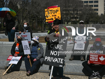 Health-care workers, activists and their supporters protest against Premier Kenney and the UCP government that are taking steps to privatize...