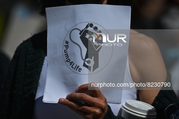 A protester holds a placard with words '#Pump4Life'.
Health-care workers, activists and their supporters protested this afternoon during 'Ra...