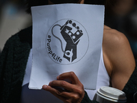 A protester holds a placard with words '#Pump4Life'.
Health-care workers, activists and their supporters protested this afternoon during 'Ra...