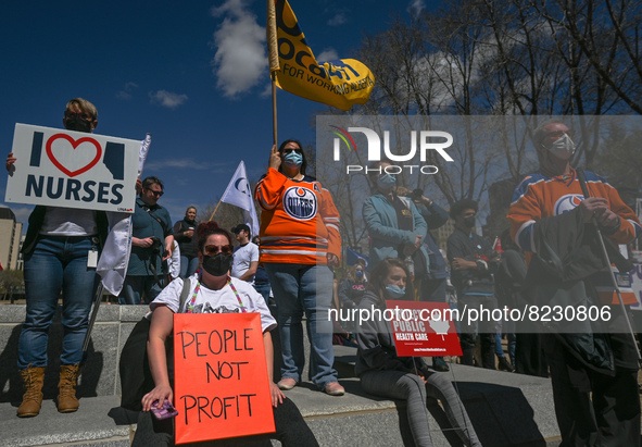 Health-care workers, activists and their supporters protest against Premier Kenney and the UCP government that are taking steps to privatize...