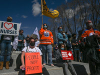 Health-care workers, activists and their supporters protest against Premier Kenney and the UCP government that are taking steps to privatize...