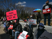 Health-care workers, activists and their supporters protest against Premier Kenney and the UCP government that are taking steps to privatize...