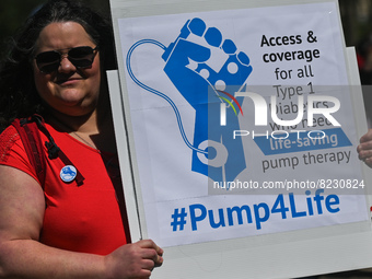 A protester holds a placard with words '#Pump4Life'.
Health-care workers, activists and their supporters protested this afternoon during 'Ra...