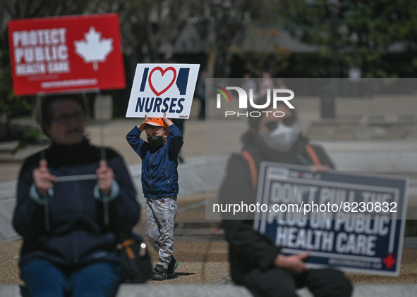 Health-care workers, activists and their supporters protest against Premier Kenney and the UCP government that are taking steps to privatize...