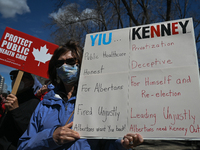 Health-care workers, activists and their supporters protest against Premier Kenney and the UCP government that are taking steps to privatize...