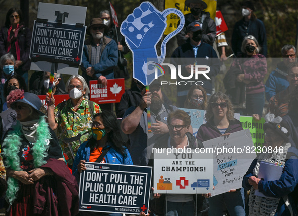 Health-care workers, activists and their supporters protest against Premier Kenney and the UCP government that are taking steps to privatize...