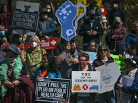 Health-care workers, activists and their supporters protest against Premier Kenney and the UCP government that are taking steps to privatize...