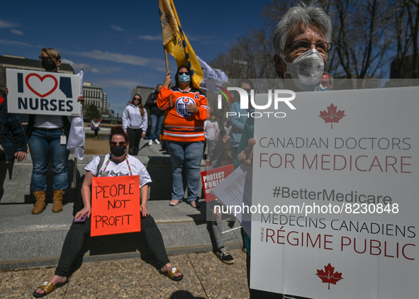 Health-care workers, activists and their supporters protest against Premier Kenney and the UCP government that are taking steps to privatize...