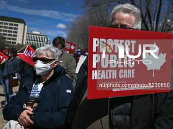 Health-care workers, activists and their supporters protest against Premier Kenney and the UCP government that are taking steps to privatize...