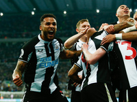 Jamaal Lascelles of Newcastle United celebrates their sides first goal during the Premier League match between Newcastle United and Arsenal...