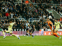 Burno Guimaraes of Newcastle United scores their sides second goal during the Premier League match between Newcastle United and Arsenal at S...