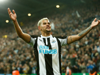 Burno Guimaraes of Newcastle United celebrates after scoring their sides second goal during the Premier League match between Newcastle Unite...