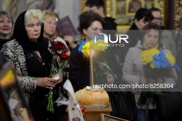 KYIV, UKRAINE - MAY 18, 2022 - People pay their last respects to 95th Separate Air Assault Brigade officer, Lt Denys Antipov who perished wh...