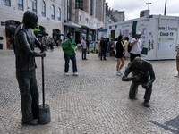 People are seen lining up to wait for a COVID-19 test at a stand located on Liberdade Avenue. Lisbon, May 23, 2022. The European Centre for...